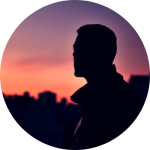 Picture of a man silhouetted against a setting sun